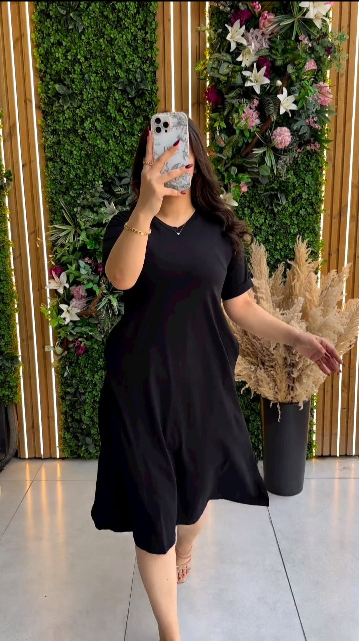 Modern Women's Short Sleeve Flowy Pocketlong Top