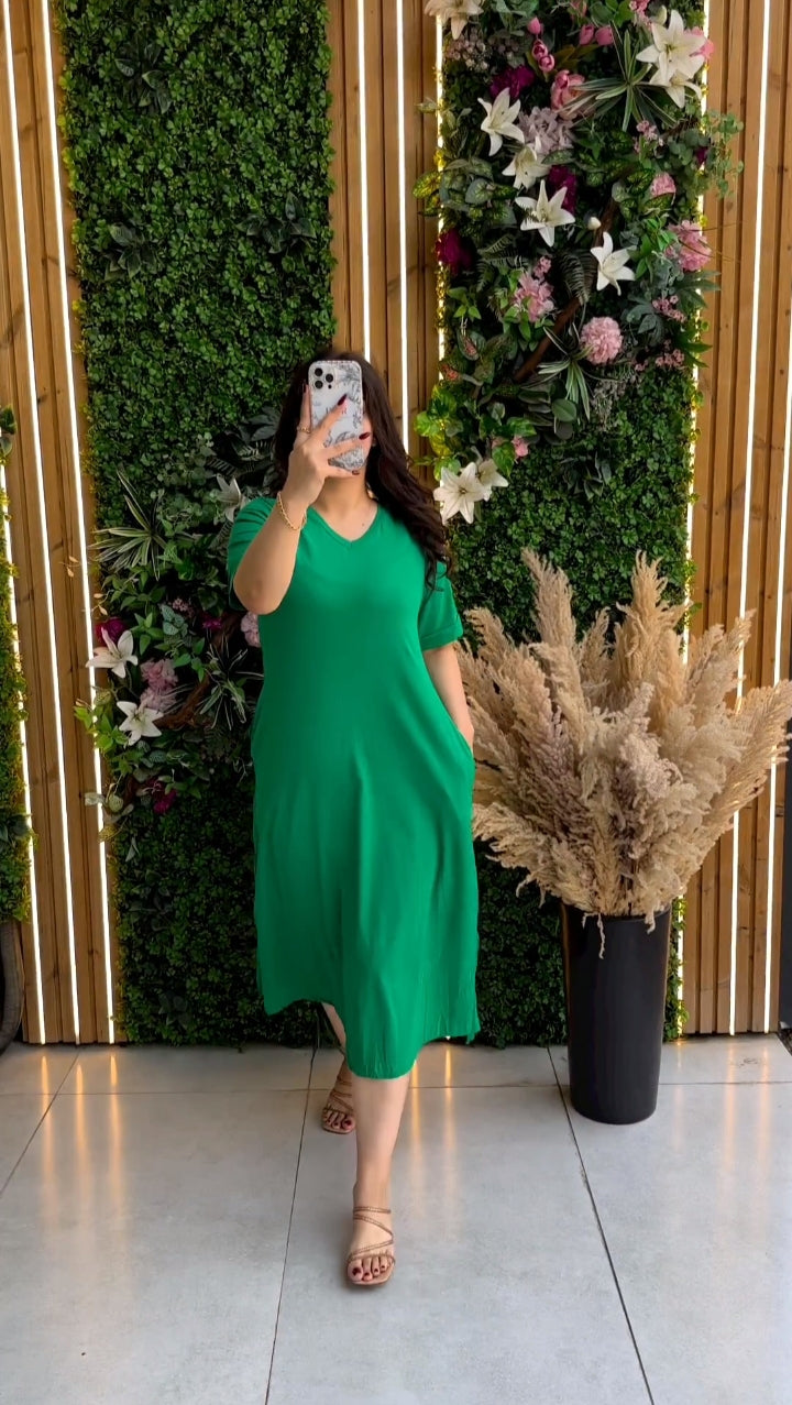 Modern Women's Short Sleeve Flowy Pocketlong Top